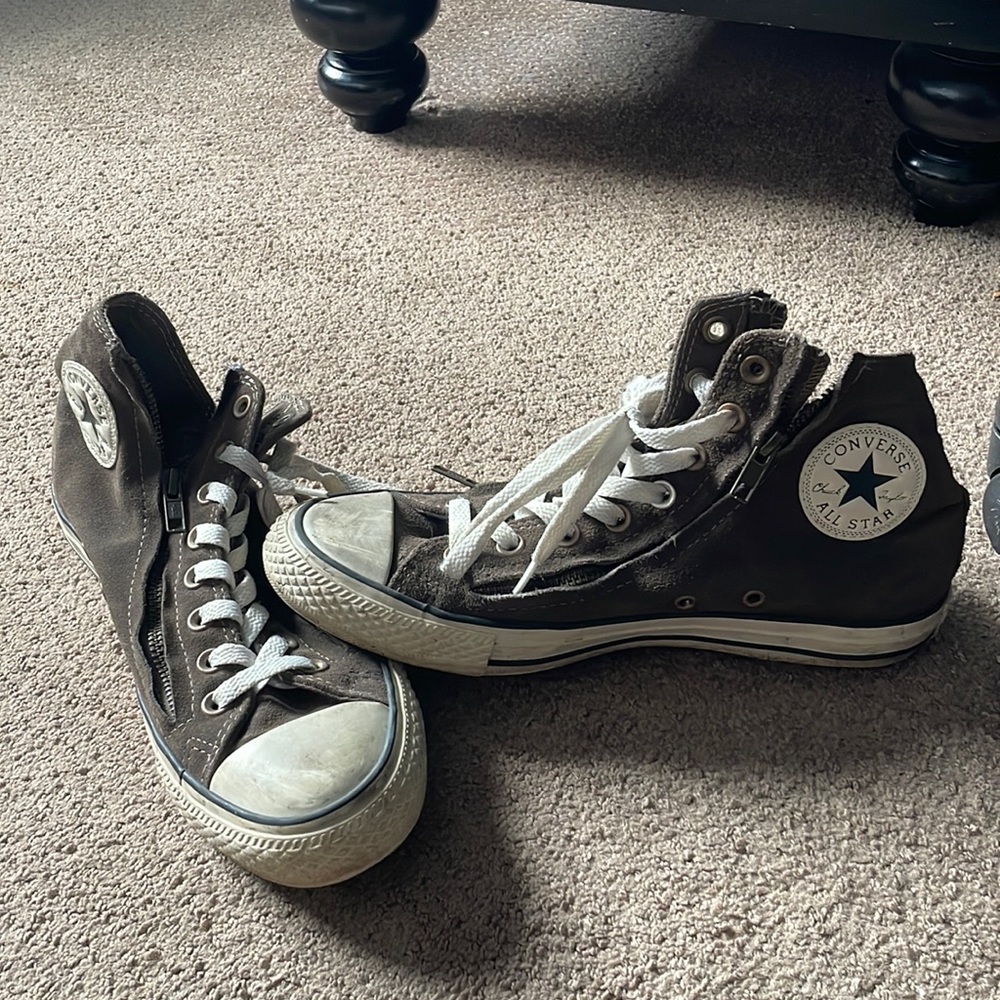 brown sneaker, a double zipper washed out look nd scuffed look for white parts